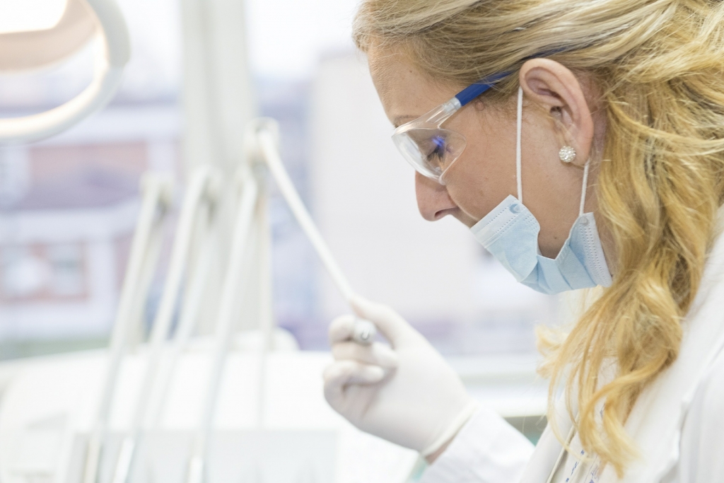 Dental hygienist at work