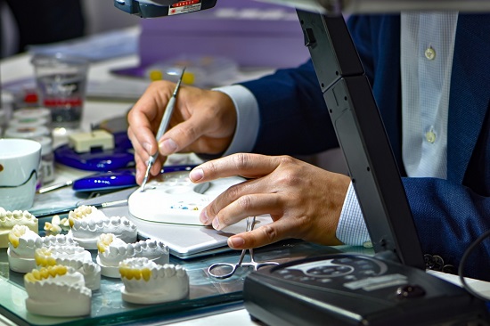 Dental lab technician at work