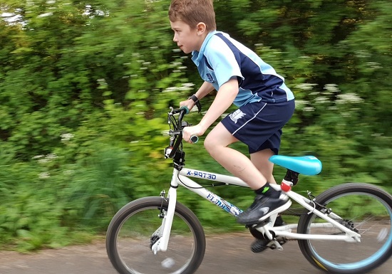 A kid riding a bike