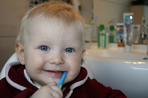 Baby likes brushing teeth