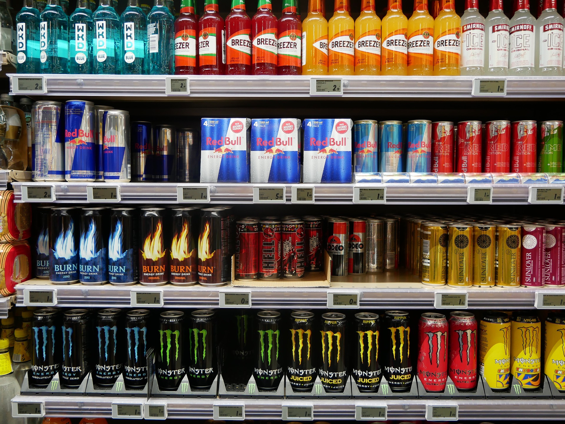 Various energy drinks in a supermarket freezer